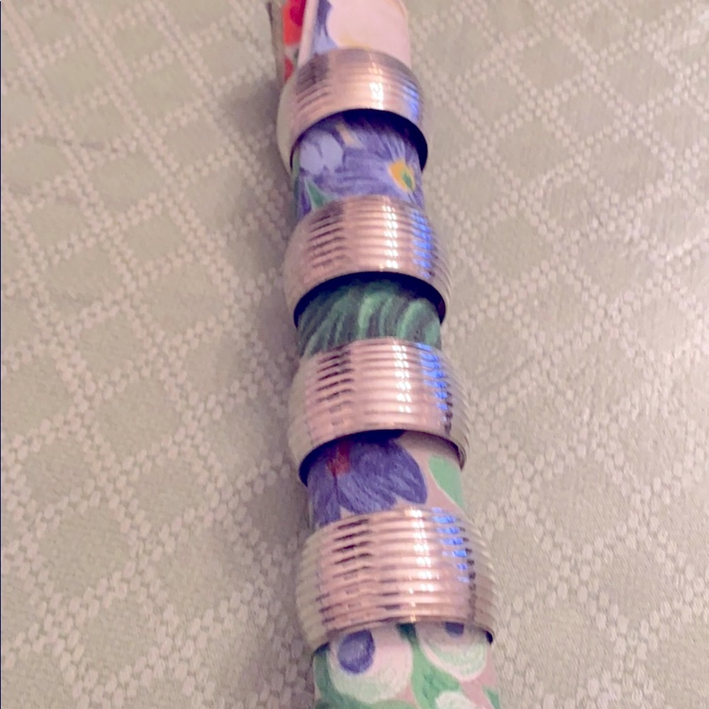 Set of 4 silver plate napkin rings